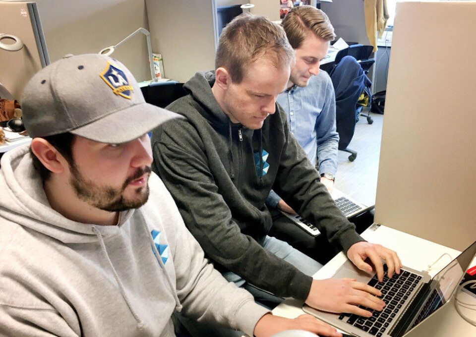 Michael McMillan, Sondre Hjetland og Eirik Fosse fant et hull i sikkerheten til NTNUs Blackboard-system.