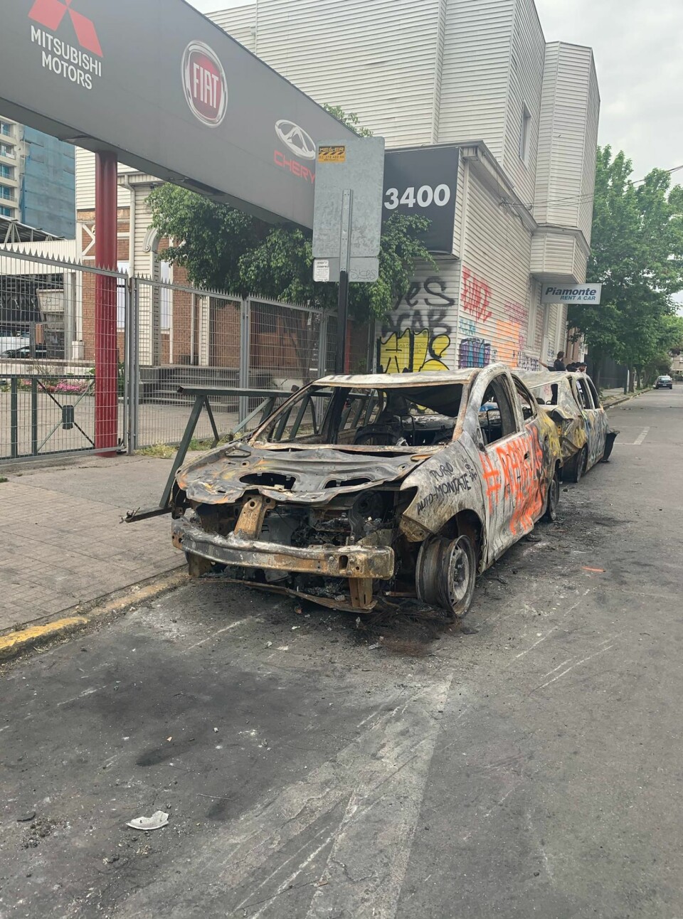 VANDALISM: The protesters put fire to several buses and cars during the riots