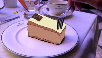 KEISERENS NYE KAKE: Oignon Frit forsøker å trenge gjennom lokket på sin napoleonskake. KEISERENS NYE KAKE: Oignon Frit forsøker å trenge gjennom lokket på sin napoleonskake.